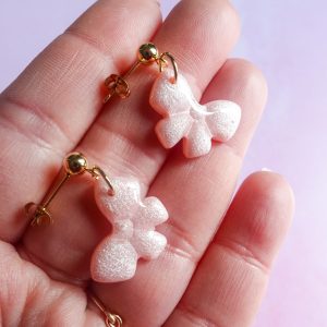 Boucles d'oreilles nœud rose